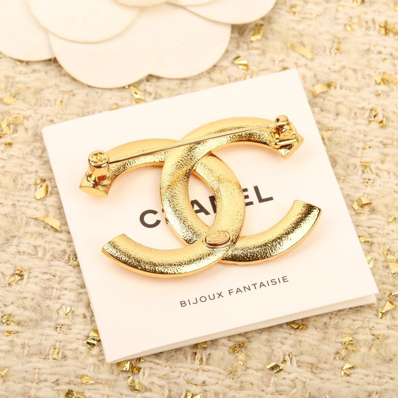 Ch**el brooches